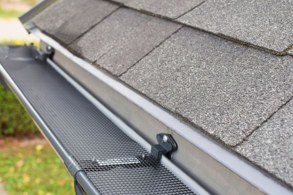 Covered Gutter Installation in Lenoir